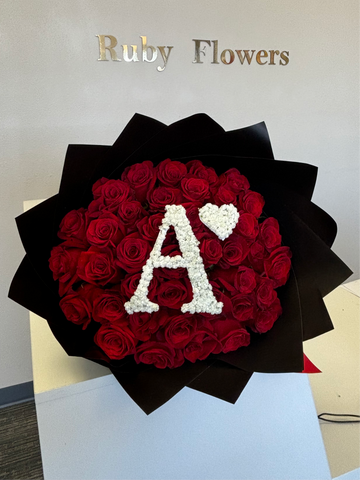 Bouquet of roses with initial letter